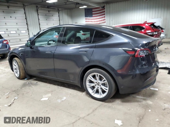 2024 Tesla Model Y Long Range with VIN 7SAYGDEE1RA254860, listed as a Copart auction lot 50750225 with 12,343 mi miles and Salvage Title. Bid and sale history available at DreamBid. Image 2.