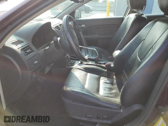 2012 Ford Fusion SEL z VIN 3FAHP0JA4CR410011, wystawiony jako Copart lot #57872835 z przebiegiem 187 756 mil mil oraz Szkoda całkowita • Salvage title. Historia ofert i sprzedaży dostępna na DreamBid. Obrazek 7.