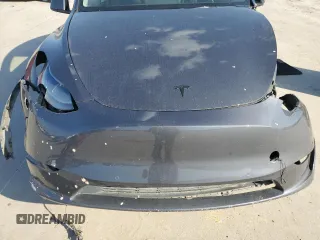 2022 Tesla Model Y Performance with VIN 7SAYGDEF8NF384270, listed as a Copart auction lot 56718215 with Not provided miles and Salvage title. Bid and sale history available at DreamBid. Image 12.