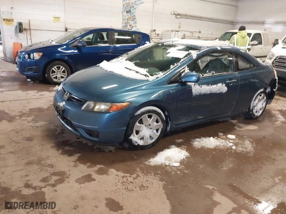 2007 Honda Civic Cpe LX with VIN 2HGFG12657H501602, listed as a IAAI auction lot 41715412 with 164,141 mi miles. Bid and sale history available at carsss.com. Image 2.