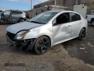 2012 Nissan Sentra SE-R with VIN 3N1BB6AP2CL648581, listed as a Copart auction lot 72445204 with 157,783 mi miles and Salvage Title. Bid and sale history available at DreamBid. Image 1.