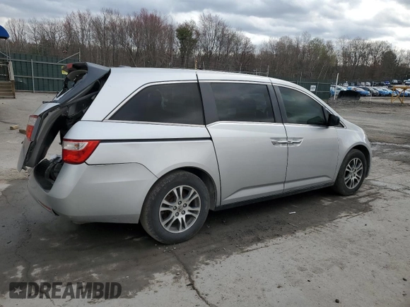 2011 Honda Odyssey EX-L with VIN 5FNRL5H63BB098661, listed as a Copart auction lot 52566345 with 177,071 mi miles and Salvage Title. Bid and sale history available at DreamBid. Image 3.