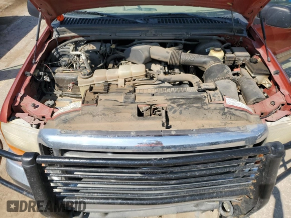 1999 Ford F-250 XL with VIN 1FTNX21SXXEE40026, listed as a Copart auction lot 69888634 with 215,535 mi miles and Salvage title. Bid and sale history available at DreamBid. Image 11.