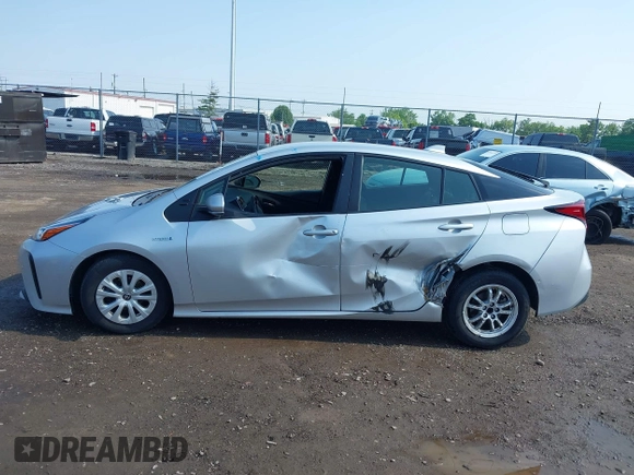 2022 Toyota Prius L Eco z VIN JTDKAMFU2N3165805, wystawiony jako IAAI lot #42428676 z przebiegiem 435 471 mil mil oraz . Historia ofert i sprzedaży dostępna na DreamBid. Obrazek 14.