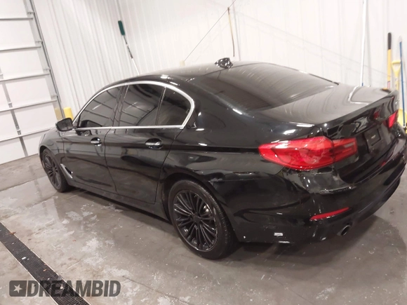 2018 BMW 5 Series 530i with VIN WBAJA5C52JWA37569, listed as a IAAI auction lot 41240799 with 80,116 mi miles and . Bid and sale history available at DreamBid. Image 3.