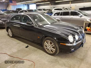 2003 Jaguar S-Type z VIN SAJEA01U93HM84195, wystawiony jako Copart lot #54300574 z przebiegiem 98 820 mil mil oraz Czysty tytuł • Clean title. Historia ofert i sprzedaży dostępna na DreamBid. Obrazek 4.