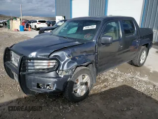 2010 Honda Ridgeline RTL with VIN 5FPYK1F58AB006922, listed as a Copart auction lot 44967355 with 202,067 mi miles and Salvage Title. Bid and sale history available at carsss.com. Image 1.