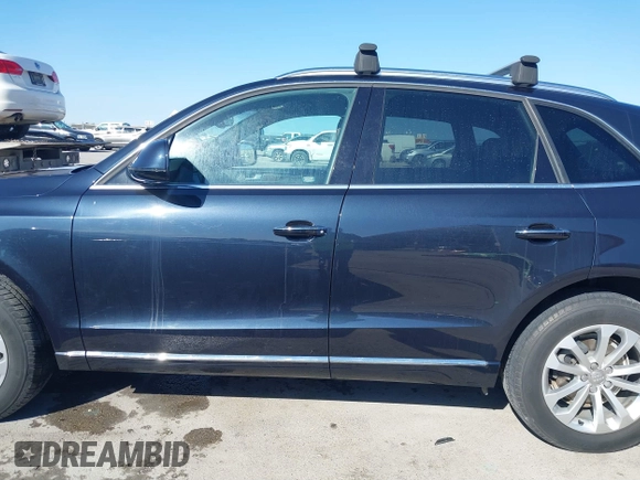 2015 Audi Q5 Premium Plus with VIN WA1LFAFP7FA119828, listed as a IAAI auction lot 41023540 with 69,087 mi miles. Bid and sale history available at carsss.com. Image 15.