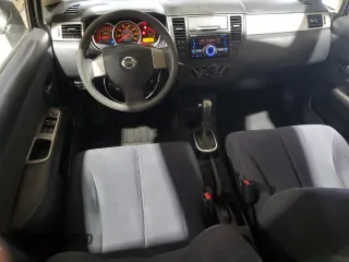 2007 Nissan Versa 1.8 S with VIN 3N1BC13E87L409263, listed as a Copart auction lot 53565105 with 124,860 mi miles and Salvage Title. Bid and sale history available at carsss.com. Image 8.