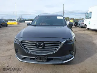 2016 Mazda CX-9 Signature with VIN JM3TCBEY7G0112486, listed as a IAAI auction lot 41592723 with 91,392 mi miles. Bid and sale history available at carsss.com. Image 12.