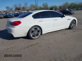 2016 BMW 6 Series 640i xDrive with VIN WBA6D2C51GGT66209, listed as a IAAI auction lot 42064405 with 113,500 mi miles and . Bid and sale history available at carsss.com. Image 4.