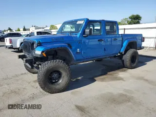 2022 Jeep Gladiator Texas Trail with VIN 1C6HJTAG4NL135346, listed as a Copart auction lot 56003285 with 40,125 mi miles and Salvage title. Bid and sale history available at DreamBid. Image 1.