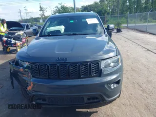 2018 Jeep Grand Cherokee Altitude with VIN 1C4RJFAG7JC394051, listed as a IAAI auction lot 42492771 with 147,669 mi miles and . Bid and sale history available at DreamBid. Image 12.