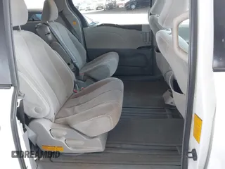 2012 Toyota Sienna LE AAS with VIN 5TDKK3DC4CS274117, listed as a IAAI auction lot 42008690 with 205,353 mi miles. Bid and sale history available at carsss.com. Image 8.
