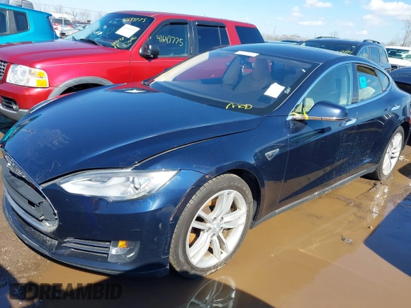 2013 Tesla Model S with VIN 5YJSA1CG2DFP14689, listed as a IAAI auction lot 41648508 with 98,578 mi miles and . Bid and sale history available at carsss.com. Image 18.