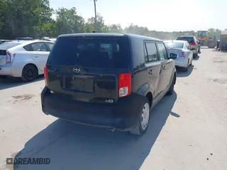 2011 Scion xB with VIN JTLZE4FE9B1118729, listed as a IAAI auction lot 40312454 with 129,260 mi miles. Bid and sale history available at carsss.com. Image 4.