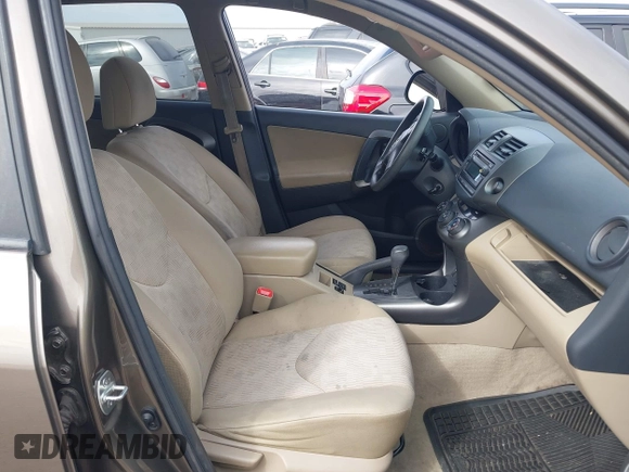 2012 Toyota RAV4 with VIN 2T3BF4DV5CW217158, listed as a IAAI auction lot 42383390 with 199,443 mi miles and . Bid and sale history available at DreamBid. Image 5.