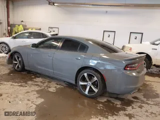 2017 Dodge Charger SE with VIN 2C3CDXBG0HH546619, listed as a IAAI auction lot 41617484 with 105,574 mi miles. Bid and sale history available at carsss.com. Image 3.