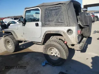 2003 Jeep Wrangler X with VIN 1J4FA39S63P304582, listed as a Copart auction lot 83576014 with 139,002 mi miles and Salvage Title. Bid and sale history available at carsss.com. Image 2.