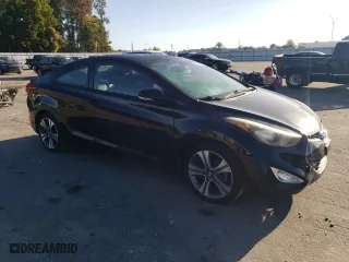 2014 Hyundai Elantra Coupe with VIN KMHDH6AH7EU026091, listed as a Copart auction lot 76913384 with 138,958 mi miles and Salvage Title. Bid and sale history available at carsss.com. Image 4.