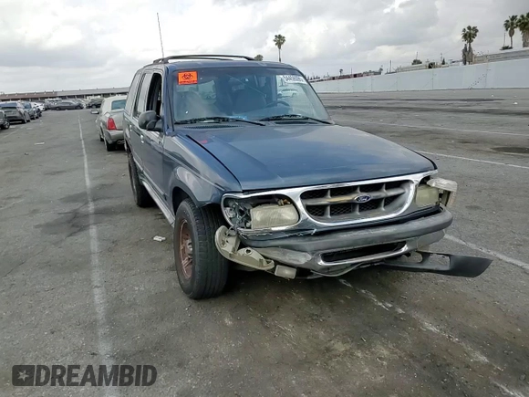 1998 Ford Explorer XL z VIN 1FMZU34EXWZA13244, wystawiony jako Copart lot #54456095 z przebiegiem 192 527 mil mil oraz Szkoda całkowita • Salvage title. Historia ofert i sprzedaży dostępna na DreamBid. Obrazek 14.