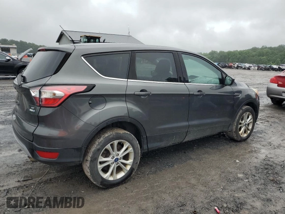 2017 Ford Escape SE z VIN 1FMCU9GD4HUE68604, wystawiony jako Copart lot #61170775 z przebiegiem 152 286 mil mil oraz Czysty tytuł • Clean title. Historia ofert i sprzedaży dostępna na DreamBid. Obrazek 3.