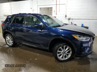 2015 Mazda CX-5 Grand Touring with VIN JM3KE4DY0F0493650, listed as a Copart auction lot 86371104 with 226,752 mi miles and Non Repairable. Bid and sale history available at DreamBid. Image 4.