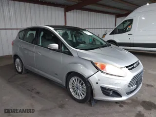 2013 Ford C-Max Energi SEL with VIN 1FADP5CUXDL521522, listed as a IAAI auction lot 41548618 with 188,495 mi miles. Bid and sale history available at carsss.com. Image 1.
