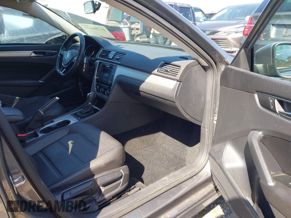 2019 Volkswagen Passat 2.0T Wolfsburg Edition with VIN 1VWLA7A38KC003562, listed as a IAAI auction lot 41704839 with 67,313 mi miles. Bid and sale history available at carsss.com. Image 5.