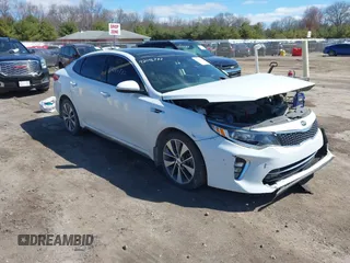 2018 Kia Optima S z VIN 5XXGT4L31JG256876, wystawiony jako IAAI lot #42046732 z przebiegiem 115 746 mil mil oraz . Historia ofert i sprzedaży dostępna na DreamBid. Obrazek 1.