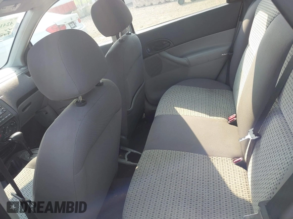 2007 Ford Focus S with VIN 1FAFP34NX7W265017, listed as a IAAI auction lot 42415556 with 71,840 mi miles and . Bid and sale history available at DreamBid. Image 8.