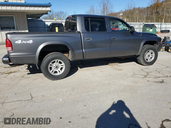 2004 Dodge Dakota Sport z VIN 1D7HG38K94S556894, wystawiony jako Copart lot #79743994 z przebiegiem 174 933 mil mil oraz Szkoda całkowita • Salvage title. Historia ofert i sprzedaży dostępna na DreamBid. Obrazek 3.