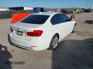 2016 BMW 3 Series 328i with VIN WBA8E9C53GK648928, listed as a IAAI auction lot 41776898 with 74,456 mi miles and . Bid and sale history available at DreamBid. Image 4.