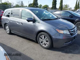 2014 Honda Odyssey EX-L with VIN 5FNRL5H64EB055807, listed as a IAAI auction lot 41760758 with 144,346 mi miles and . Bid and sale history available at carsss.com. Image 1.
