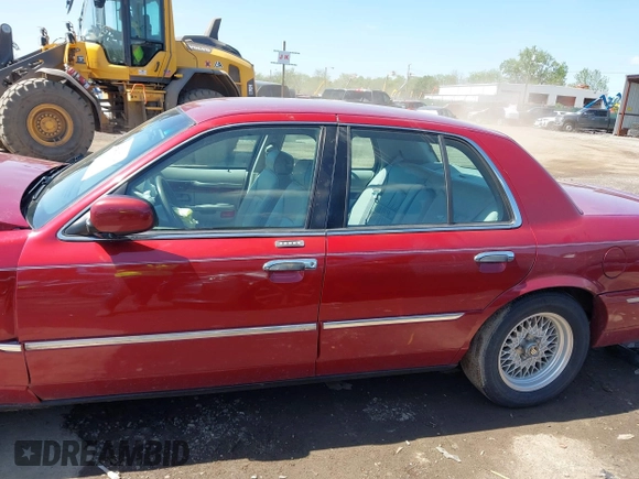 2002 Mercury Grand Marquis LS Premium z VIN 2MEFM75W22X653775, wystawiony jako IAAI lot #42225138 z przebiegiem 124 749 mil mil oraz . Historia ofert i sprzedaży dostępna na DreamBid. Obrazek 14.