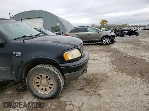 2001 Ford F-150 XL z VIN 1FTRX18W21KA55346, wystawiony jako Copart lot #79252584 z przebiegiem 347 300 mil mil oraz Szkoda całkowita • Salvage title. Historia ofert i sprzedaży dostępna na DreamBid. Obrazek 11.