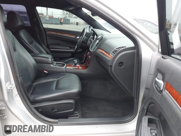 2012 Chrysler 300 Limited with VIN 2C3CCACG6CH309558, listed as a IAAI auction lot 42499372 with 145,414 mi miles and . Bid and sale history available at DreamBid. Image 5.