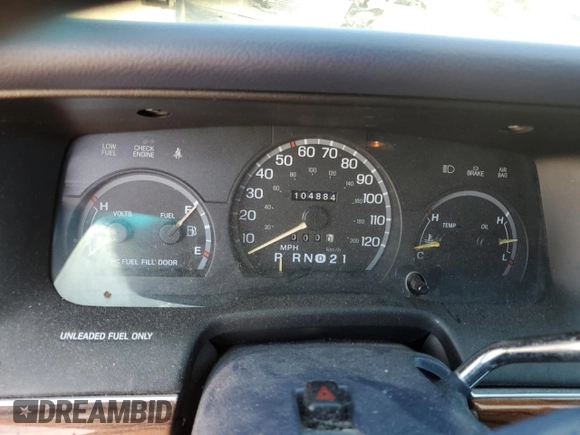 1995 Ford Crown Victoria z VIN 2FALP73W7SX158296, wystawiony jako Copart lot #56706735 z przebiegiem 104 884 mil mil oraz Czysty tytuł • Clean title. Historia ofert i sprzedaży dostępna na DreamBid. Obrazek 9.