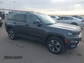 2023 Jeep Grand Cherokee with VIN 1C4RJYB69PC633433, listed as a IAAI auction lot 41912973 with 26,572 mi miles and . Bid and sale history available at DreamBid. Image 1.