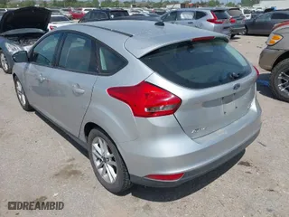 2016 Ford Focus SE with VIN 1FADP3K29GL269691, listed as a IAAI auction lot 42061051 with 100,692 mi miles. Bid and sale history available at carsss.com. Image 3.