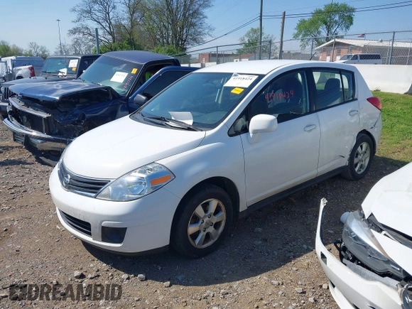 2012 Nissan Versa S with VIN 3N1BC1CPXCK212600, listed as a IAAI auction lot 41918424 with 104,483 mi miles. Bid and sale history available at carsss.com. Image 2.