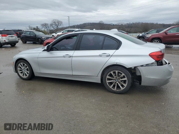 2018 BMW 3 Series 320i xDrive with VIN WBA8E5G54JNU48049, listed as a Copart auction lot 42761115 with 79,197 mi miles and Salvage Title. Bid and sale history available at carsss.com. Image 2.
