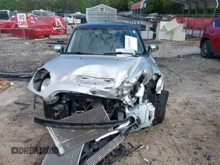 2007 MINI Hardtop S with VIN WMWMF73537TL88038, listed as a IAAI auction lot 42200252 with 70,603 mi miles and . Bid and sale history available at DreamBid. Image 13.