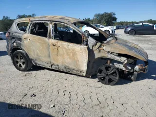 2014 Ford Escape SE with VIN 1FMCU9GX3EUC31849, listed as a Copart auction lot 51561415 with Not Provided miles and Non Repairable. Bid and sale history available at DreamBid. Image 4.