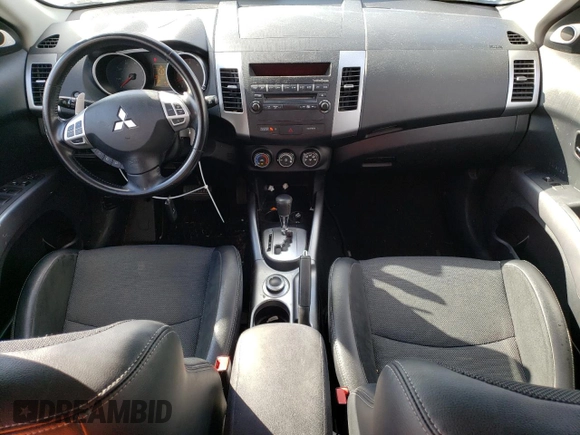 2009 Mitsubishi Outlander SE z VIN JA4MT31W69Z001475, wystawiony jako Copart lot #74098814 z przebiegiem 142 351 mil mil oraz Szkoda całkowita • Salvage title. Historia ofert i sprzedaży dostępna na DreamBid. Obrazek 8.