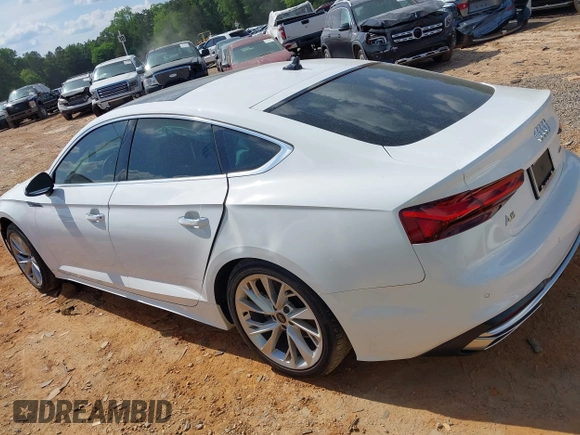 2023 Audi A5 Sportback Premium z VIN WAUABCF57PA020461, wystawiony jako IAAI lot #42230307 z przebiegiem 28 983 mil mil oraz . Historia ofert i sprzedaży dostępna na DreamBid. Obrazek 14.