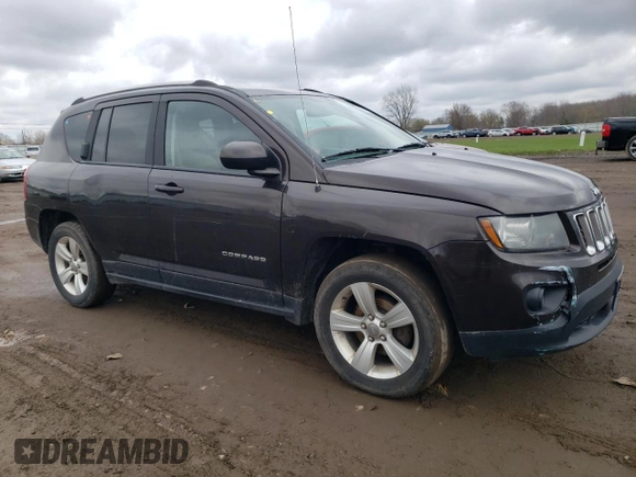 2014 Jeep Compass Sport with VIN 1C4NJDBB9ED670610, listed as a Copart auction lot 52691825 with 150,525 mi miles and Salvage Title. Bid and sale history available at carsss.com. Image 4.