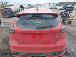 2015 Ford Focus ST with VIN 1FADP3L94FL323828, listed as a IAAI auction lot 41650672 with 101,511 mi miles. Bid and sale history available at carsss.com. Image 16.