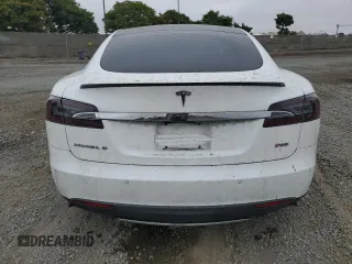 2014 Tesla Model S 60 с VIN 5YJSA1H19EFP52457, выставлен на аукционе Copart как лот 59589905 с пробегом 167 662 миль миль и Списание • Salvage title. История ставок и продаж доступна на DreamBid. Изображение 6.