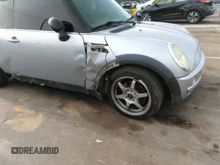 2002 MINI Hardtop with VIN WMWRC33432TE10226, listed as a IAAI auction lot 41973956 with 156,445 mi miles and . Bid and sale history available at DreamBid. Image 6.
